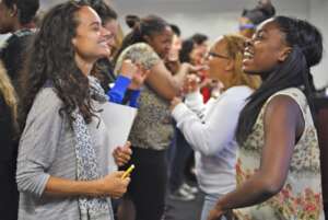 Mentees networking at a corporate partner event