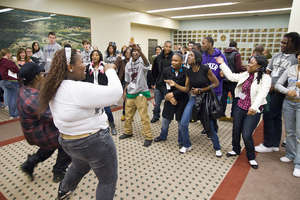 Students dancing during conference registration