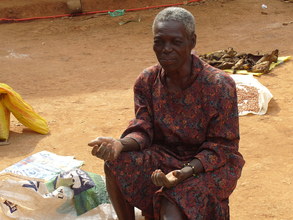A woman  in mbosha thanking donors for their help
