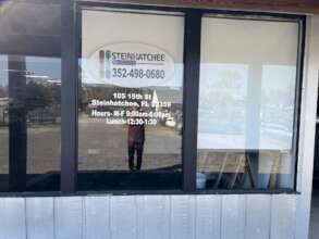 Chirag's new location - sign on window