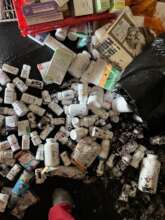 Pharmacy products damaged on floor of the pharmacy