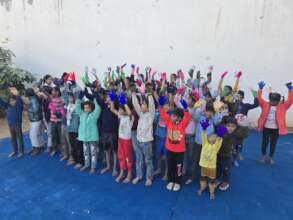Children showing off their winter mittens