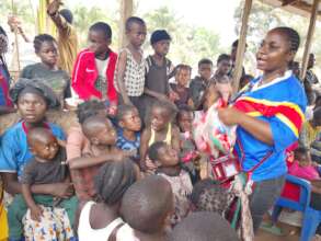 IDPs children in Inkwe Village geting things