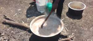 Cooking Porridge for the children during our visit