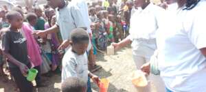Serving the children who came to get porridge