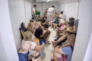 Children and parents in the shelter