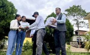 Bahinis receiving school supplies for grade 12