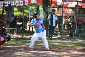 Player from Taiwan Swinging the Bat