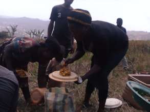 Women taking care of children in the bush