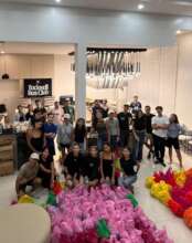 Local Volunteers in Manila help with Packing