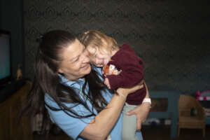 Bea at home with Family Support Worker Monica