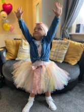 Phoebe celebrating end of cancer treatment