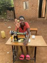 Alaisa on a sewing machime. She can make pads.