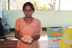 CERI Beneficiary Sells Chicken Eggs from Her Farm