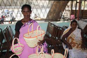 CERI Beneficiary Sells the Baskets She Wove