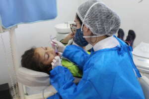 child receiving dental treatment