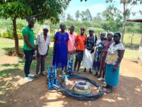Donating water pump to community group