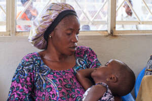 Sylvine with her child at Asili's Minova Clinic.