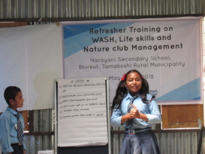 Student sharing about her Nature Club
