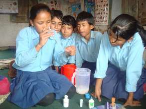 Students testing water quality and contamination