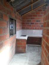 WOMAN HEAD OF HOUSEHOLD HAPPY TO RECEIVE HER HOUSI