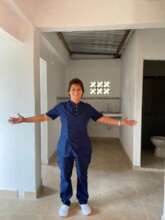 WOMAN HEAD OF HOUSEHOLD HAPPY TO RECEIVE HER HOUSI