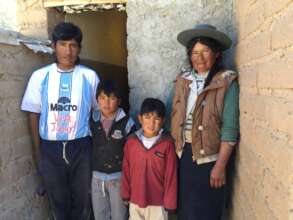 A family proudly shows off the bathroom they built