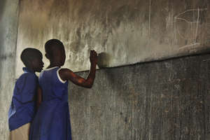 Two students collaborate to solve a problem