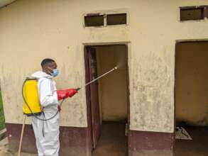 SSO team ensuring proper toilet disinfection.