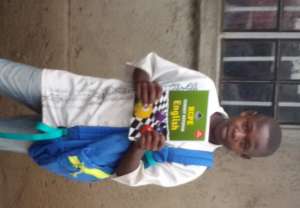 Our Number 1 Student receiving gifts
