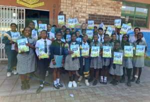 Learners from Acacia Primary receive their books
