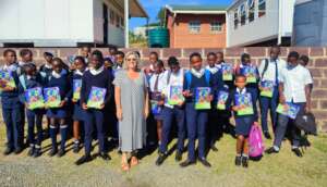St Julius learners with their books