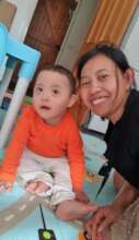 Antonio at home with mum Wahyuni