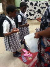 School girls buying from one of our entrepreneurs