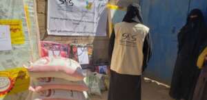 DISTRIBUTING food and shelter kits