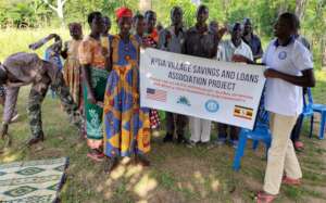 Our Founder- Zachery with loan beneficiaries