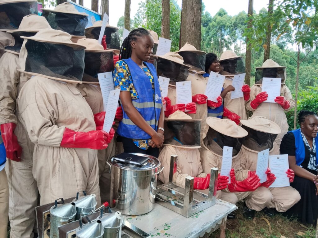 Nyamokenye members receive their bee certificates