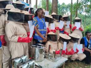 Nyamokenye members receive their bee certificates