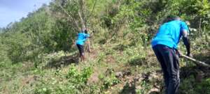Soklo Members prepare the land