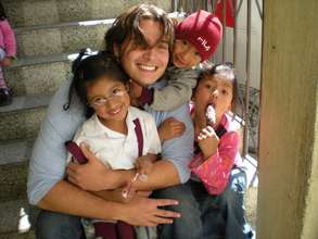 Volunteer with students
