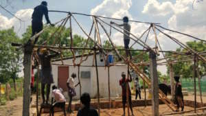 Team Work; Boys Building Additional Shed