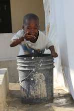 Washing his face with safe, treated water