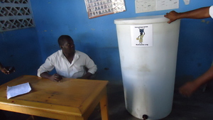 Director of school in Cite Soleil receives tank!