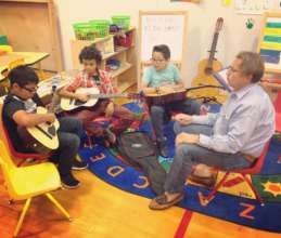 Scholar Athletes Enjoy Guitar Lessons w/ Coach Bob