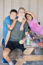 Eddy, Coach Ian, and Sophia learning about space.