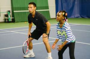 Coach Leon helps Mariyah get ready for her match