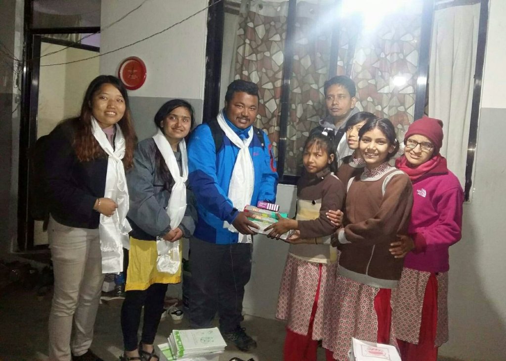 Children receive stationeries from ECCA rep.