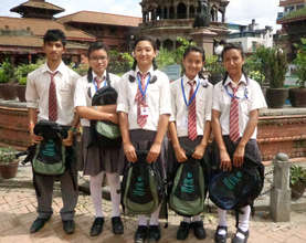 Group of students receiving scholarship materials