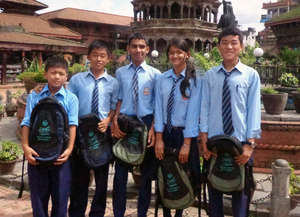 Group of students receiving scholarship materials