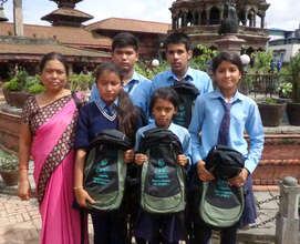 Group of students receiving scholarship materials